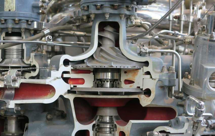 A close up of a machine with many pipes